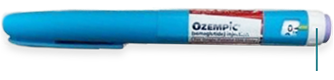 Counterfeit pen with a white dial, purple end cap, and poor-quality label