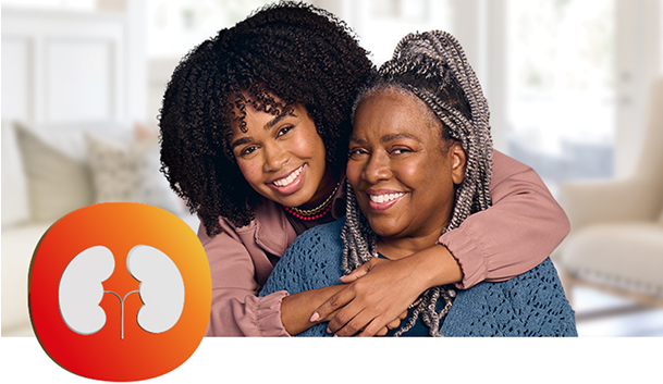 Two women hugging and smiling