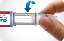 Hand attaching a needle to the Ozempic® pen